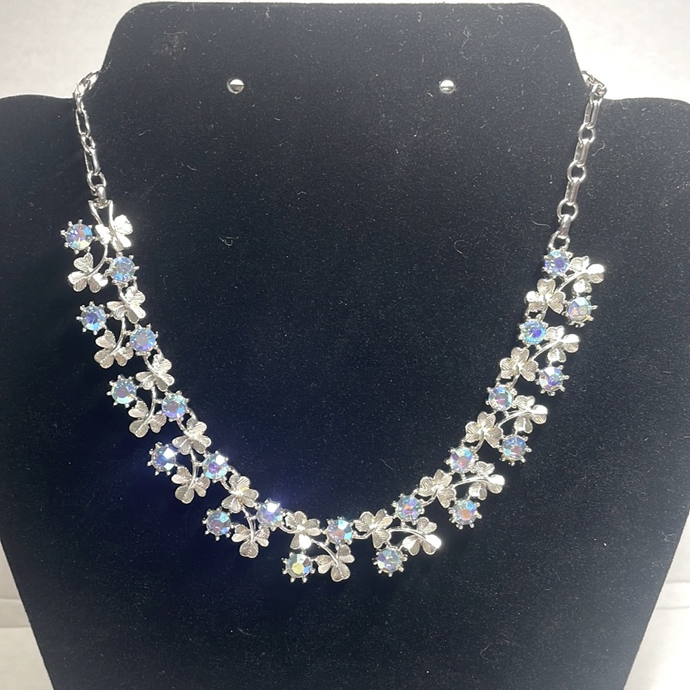 Coro vintage icy silver with aurora borealis crystal flowers.